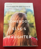 Somebody Else’s Daughter: A Novel - Elizabeth Brundage